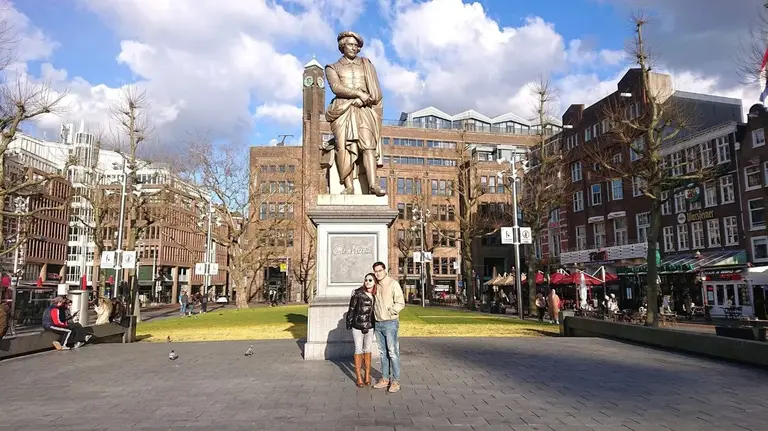 Statues and buildings on Rembrandtplein in Amsterdam