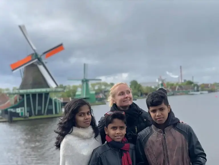 A family visiting the windmills of Zaanse Schans