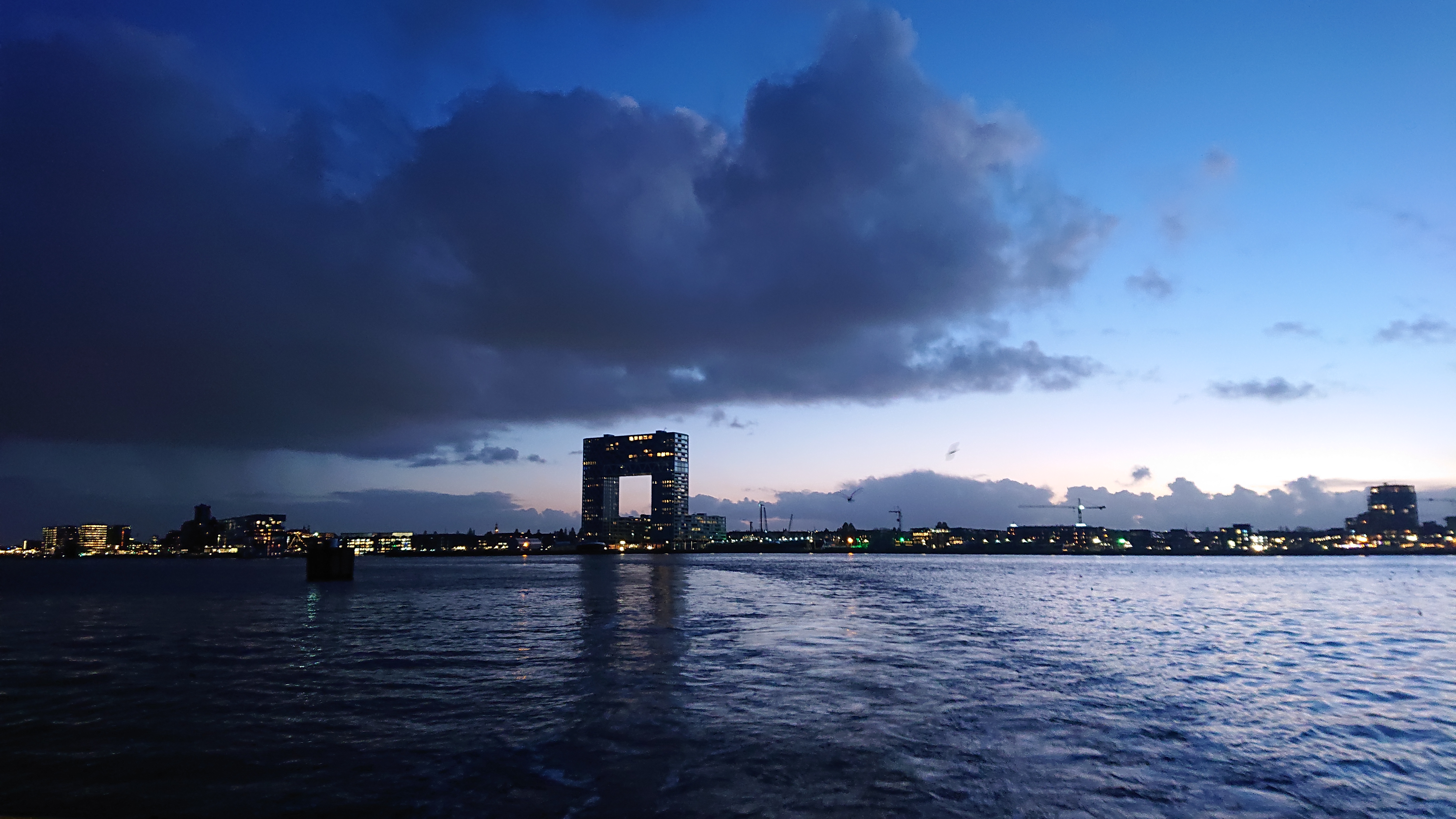 Modern waterfront architecture seen during a private Amsterdam cruise